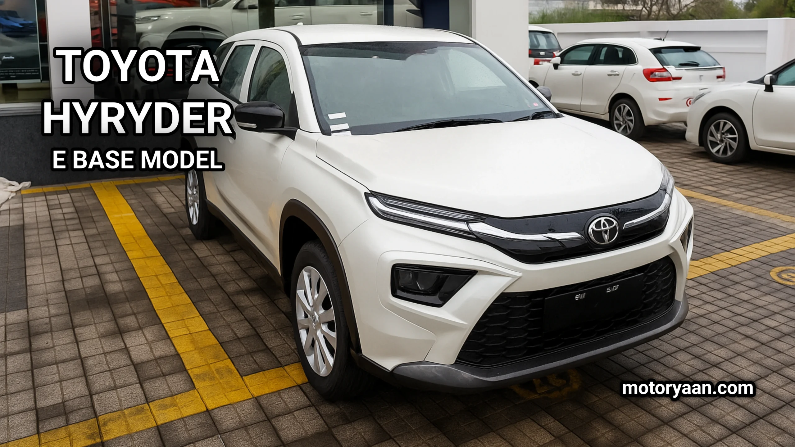 Toyota Hyryder E Base Model 2025 front and side profile in silver color