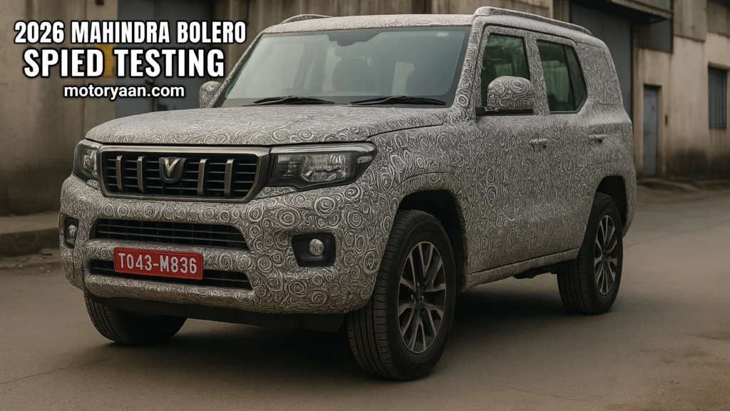 Camouflaged 2026 Mahindra Bolero spotted testing with front and side profile visible