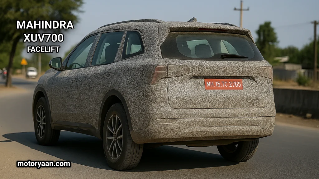 Rear and side view of 2025 Mahindra XUV700 Facelift with redesigned LED tail-lamps and camouflaged body