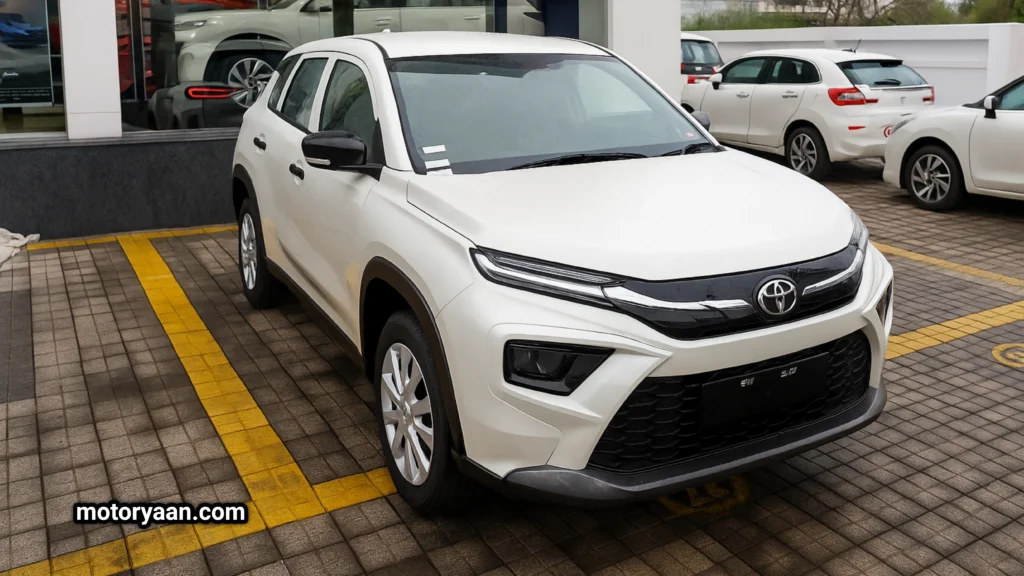 Toyota Hyryder E 2025 showing front and side profile with steel wheels and matte grille