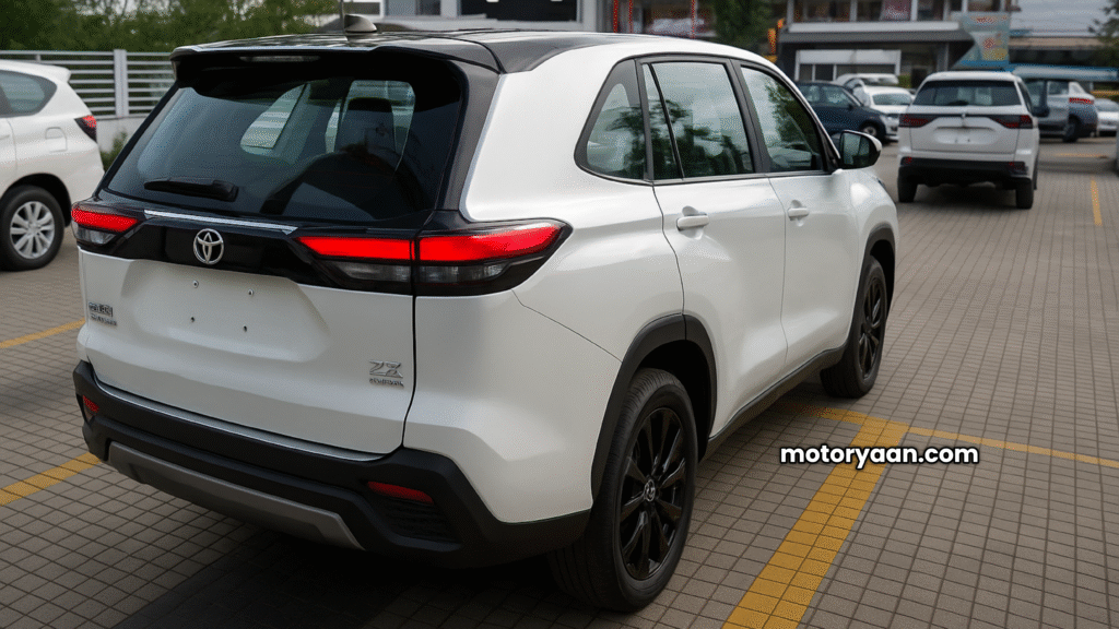 2025 Toyota Innova Hycross Exclusive Edition rear and side profile with LED tail lamps and black roof styling