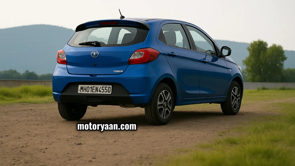 Rear and side profile of the 2025 Tata Tiago CNG AMT variant highlighting twin-cylinder CNG placement and sharp hatchback design