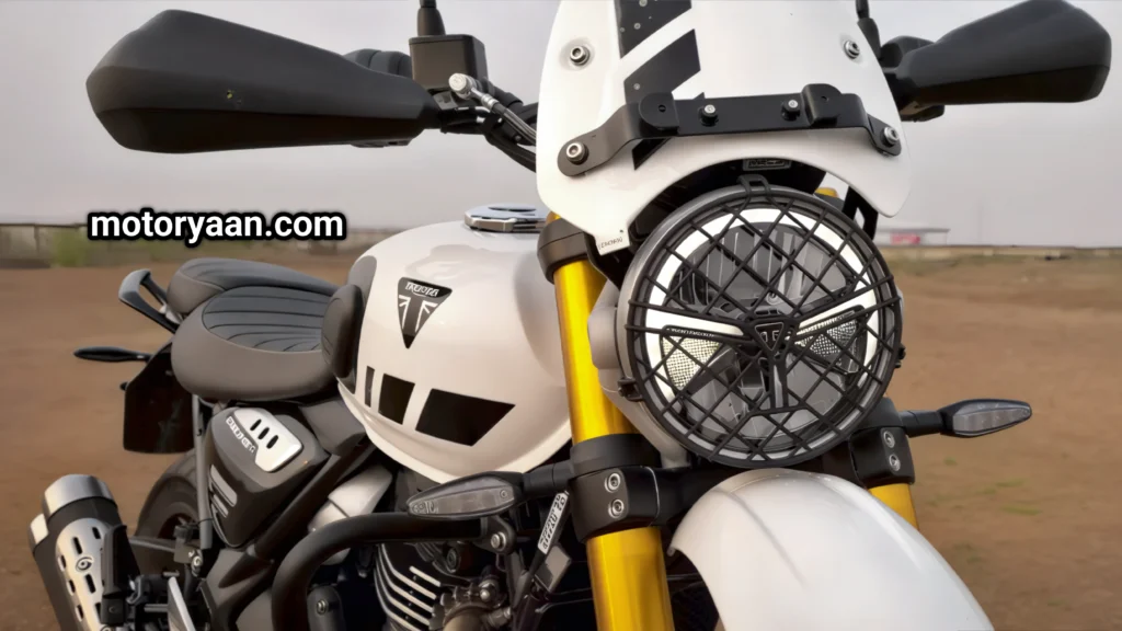 2025 Triumph Scrambler 400 XC front view with round LED headlamp and beak-style fender