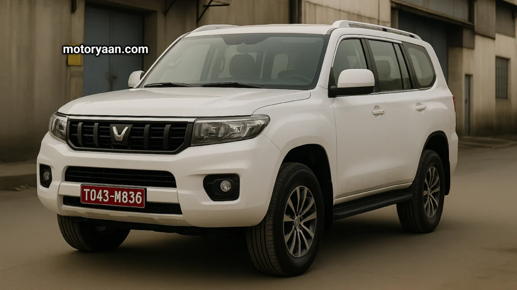 Front and rear view of the 2026 Mahindra Bolero in pearl white with bold grille, LED tail lamps, and Scorpio-N style alloy wheels