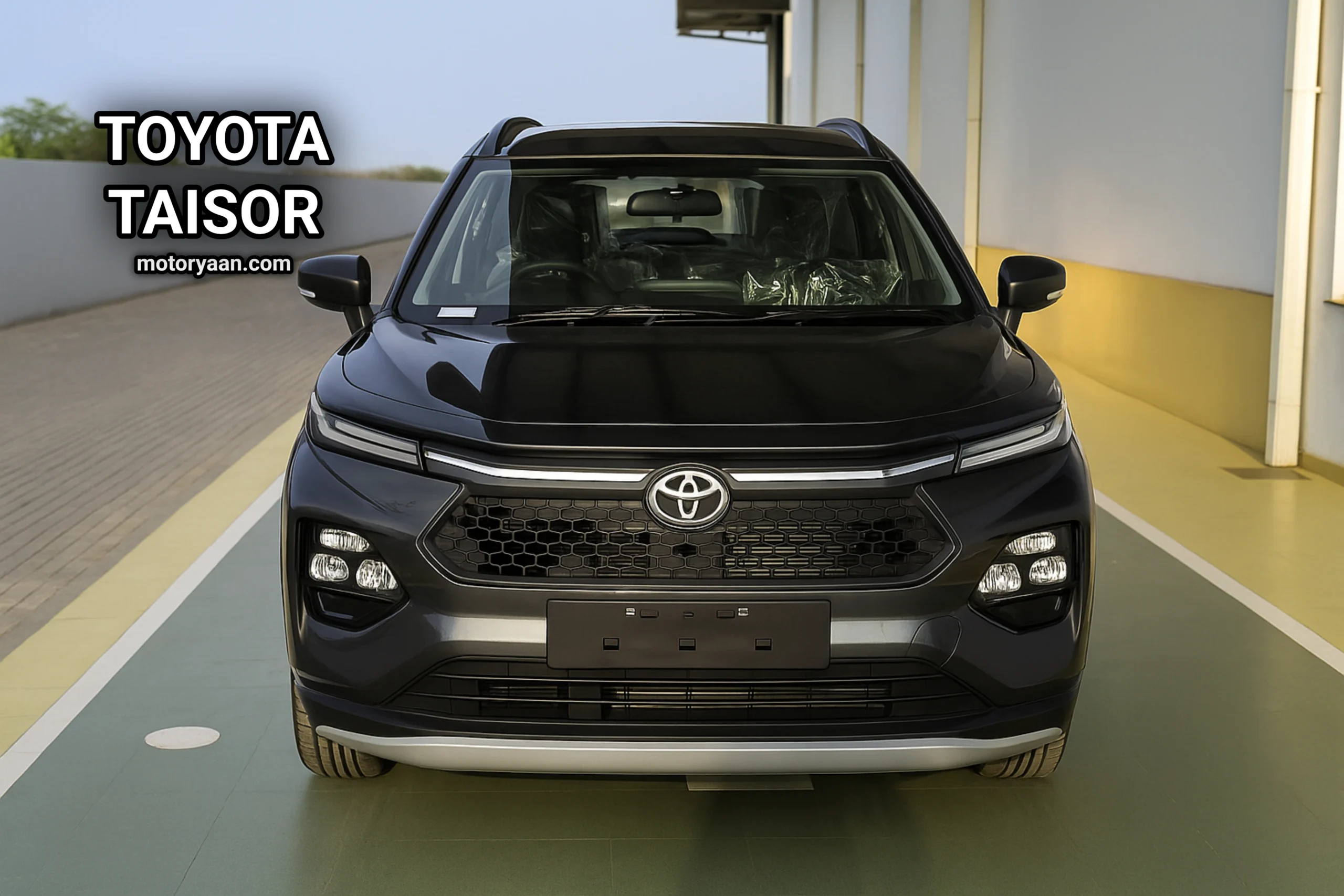 Toyota Taisor front profile view showcasing LED headlamps and bold grille design