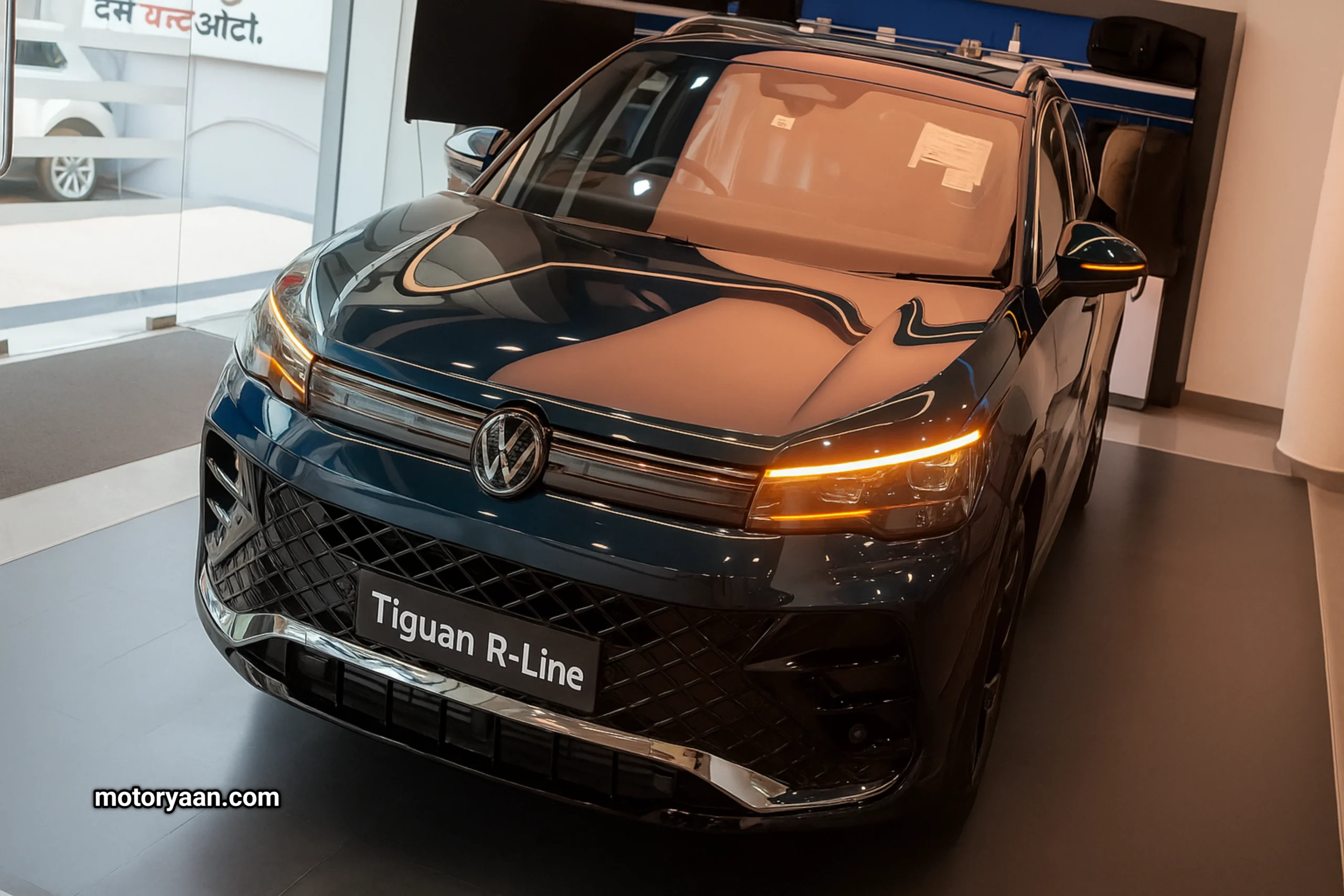 Volkswagen Tiguan R-Line front profile showcasing LED headlamps and bold grille