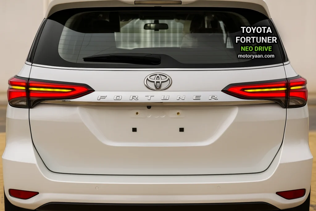 Rear view of Toyota Fortuner Neo Drive with LED tail-lamps and spoiler.