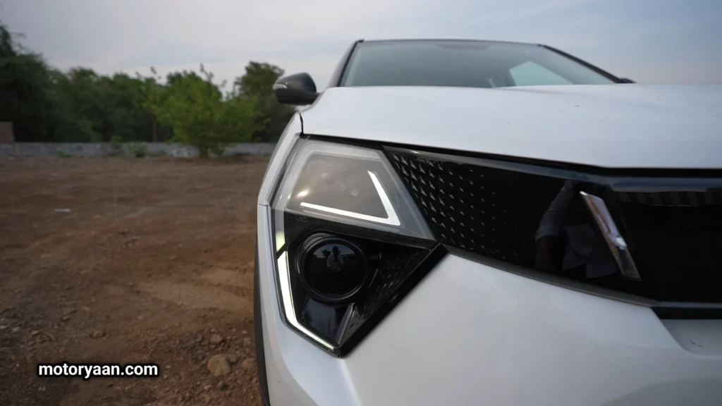 Mahindra XUV-3XO LED headlight assembly with C-shaped DRLs.
