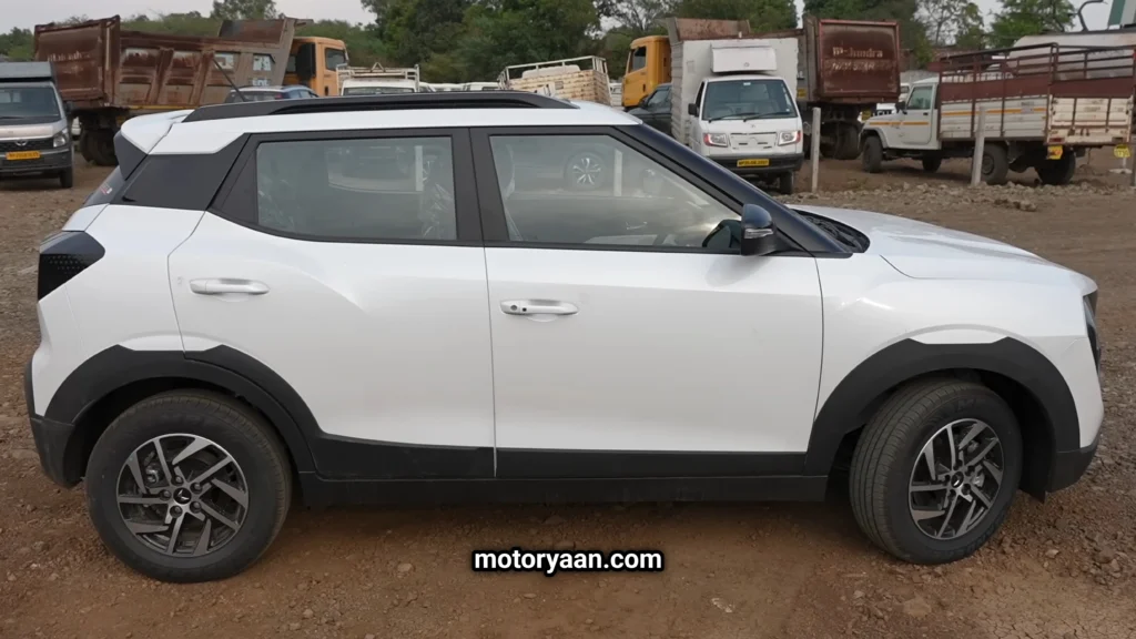 Side profile of Mahindra XUV-3XO with dual-tone alloy wheels and high stance.