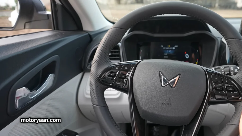 Mahindra XUV-3XO steering wheel with mounted controls and premium finish.