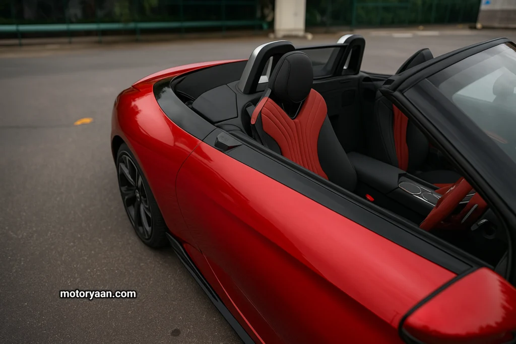MG Cyberster with convertible top down and red leather front seats