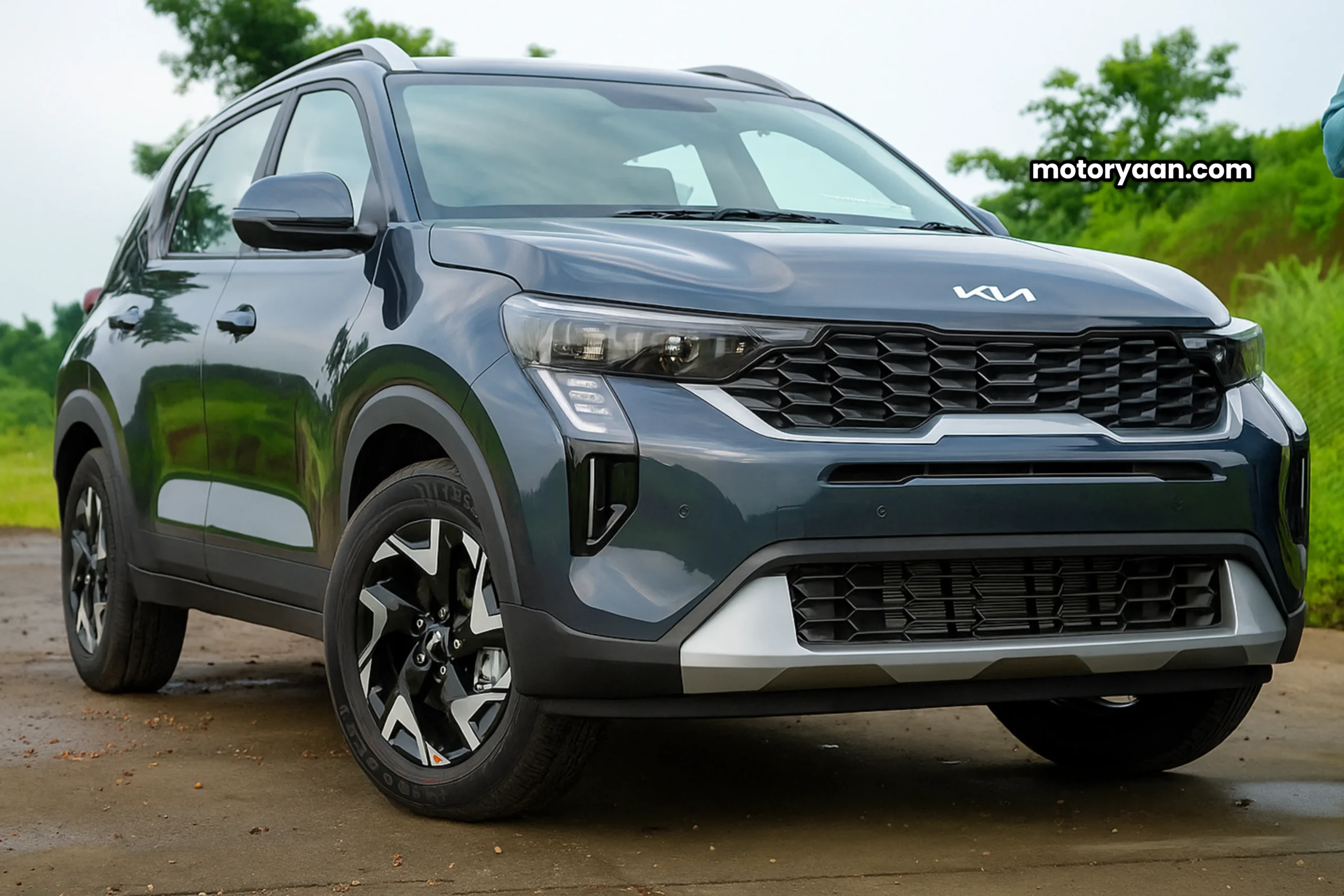Front profile view showcasing GST Benefits on 2025 Kia Sonet HTK Plus with signature grille and LED DRLs.