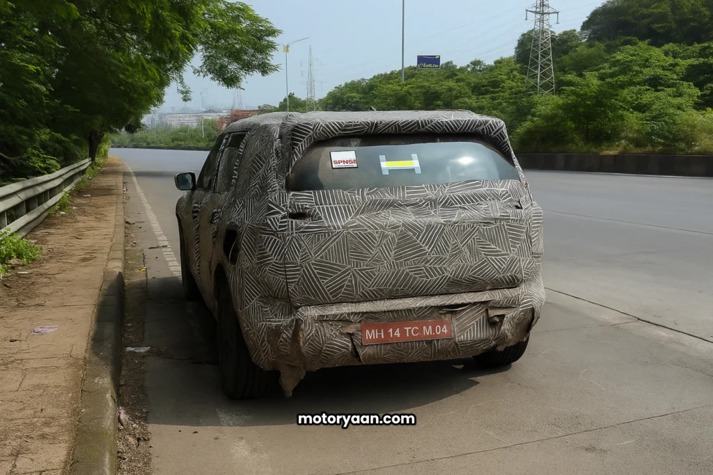 2025 Tata Sierra spied testing in Mumbai rear profile heavily camouflaged SUV