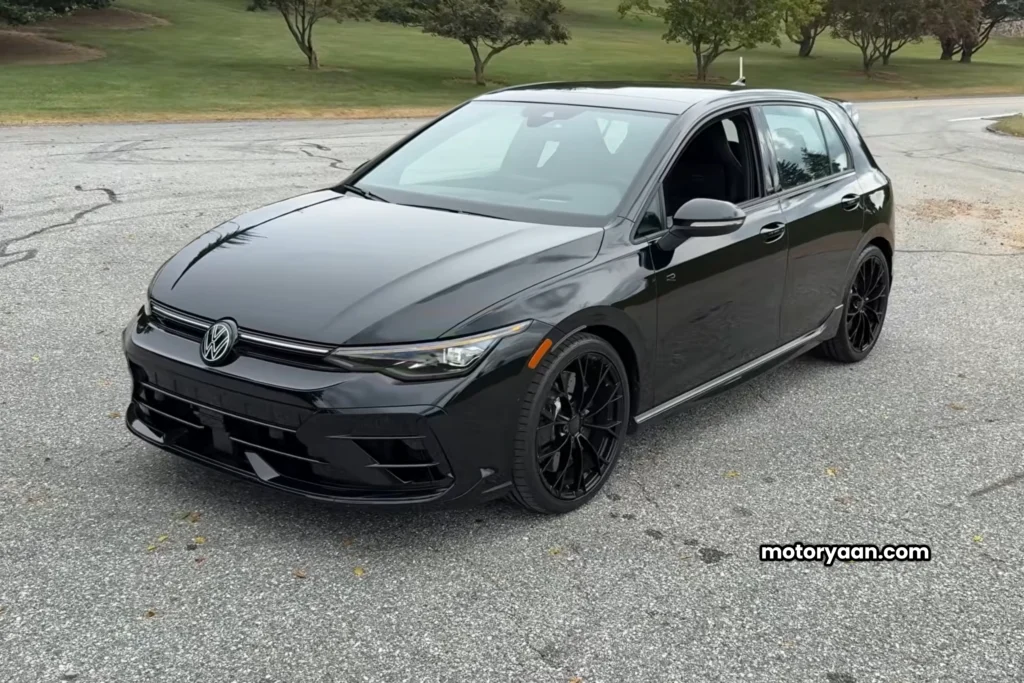 2025 Volkswagen Golf R Black Edition front and side view in Mythos Black Metallic finish