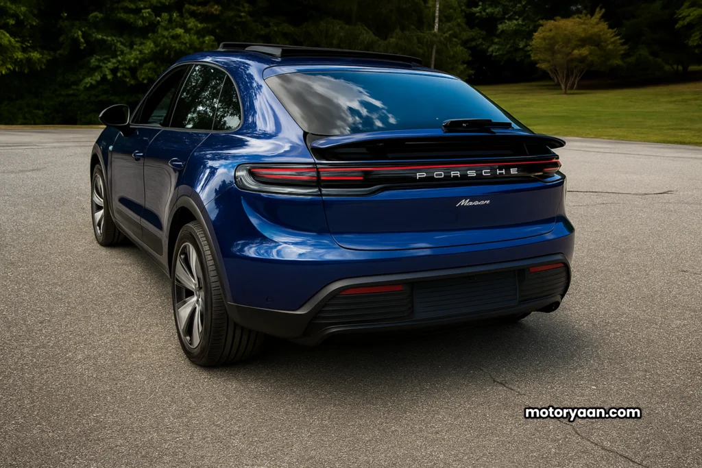 2025 Porsche Macan EV rear view with LED light bar and Porsche logo