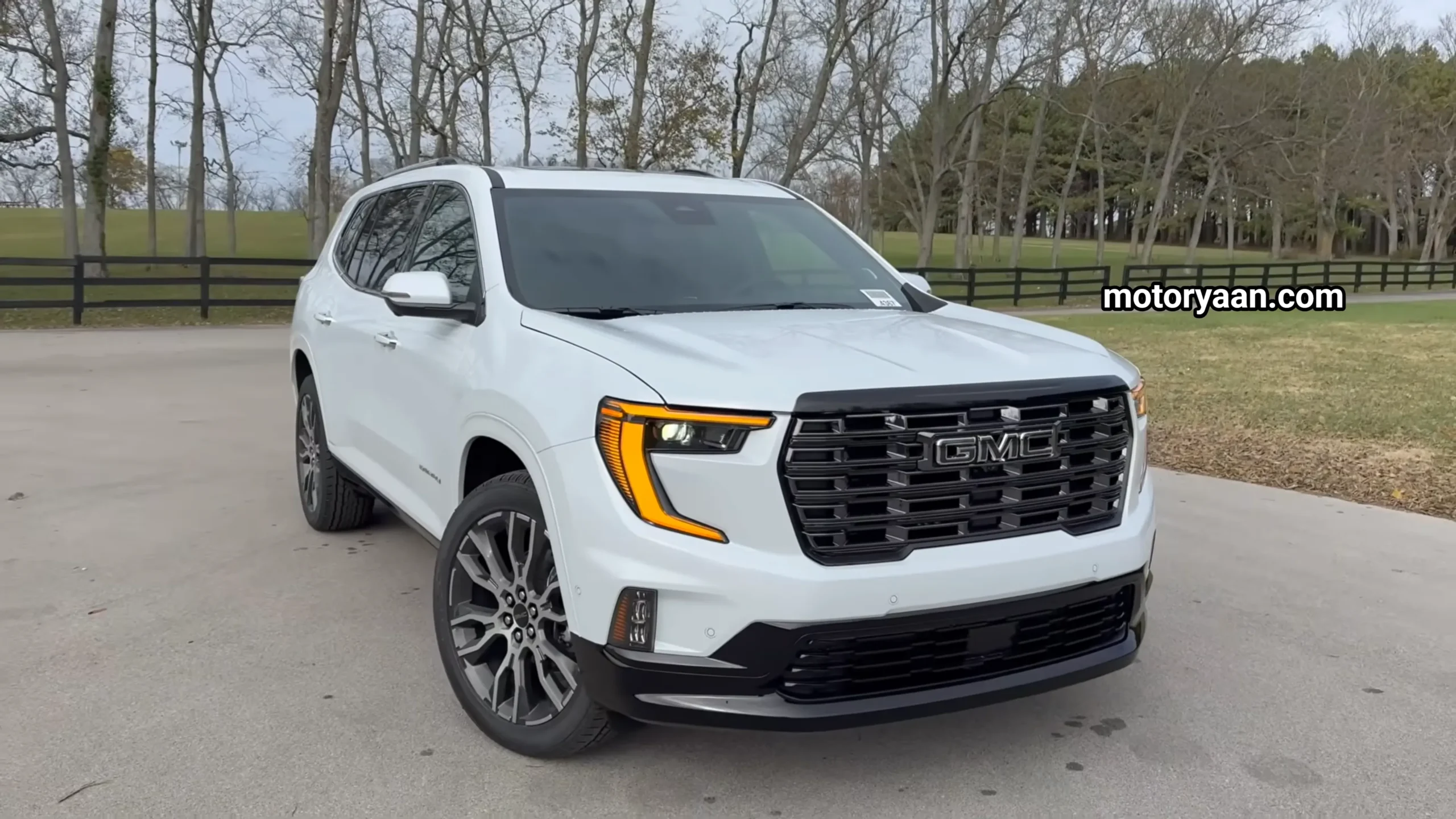 2026 GMC Acadia Denali Ultimate front and side profile showcasing new grille and bold exterior design