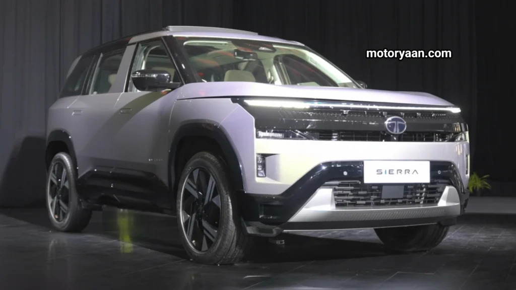 2025 Tata Sierra Accomplished Plus front and side profile showcasing slim LED headlights and premium SUV stance.