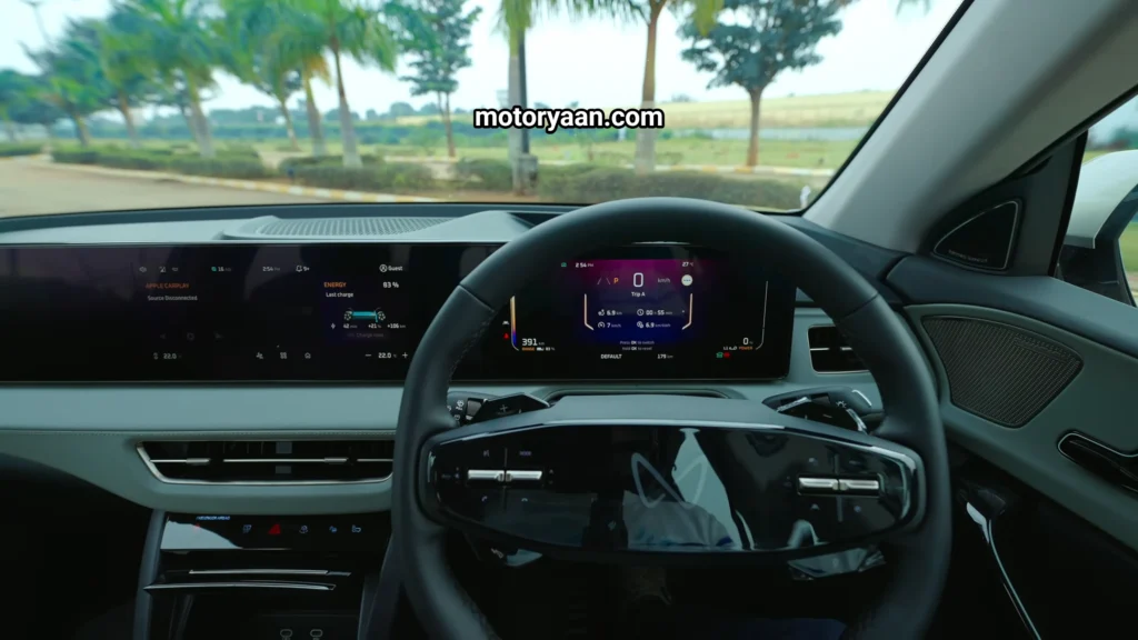 Mahindra XUV 9S Review front interior steering wheel and infotainment