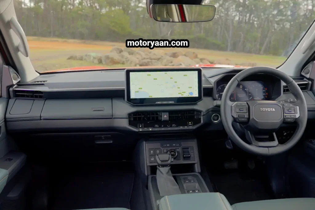 New Toyota HiLux dashboard steering wheel infotainment system and center console.