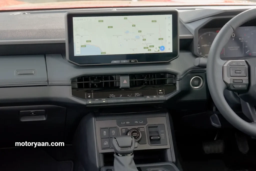 New Toyota HiLux touchscreen infotainment system with navigation and media controls.