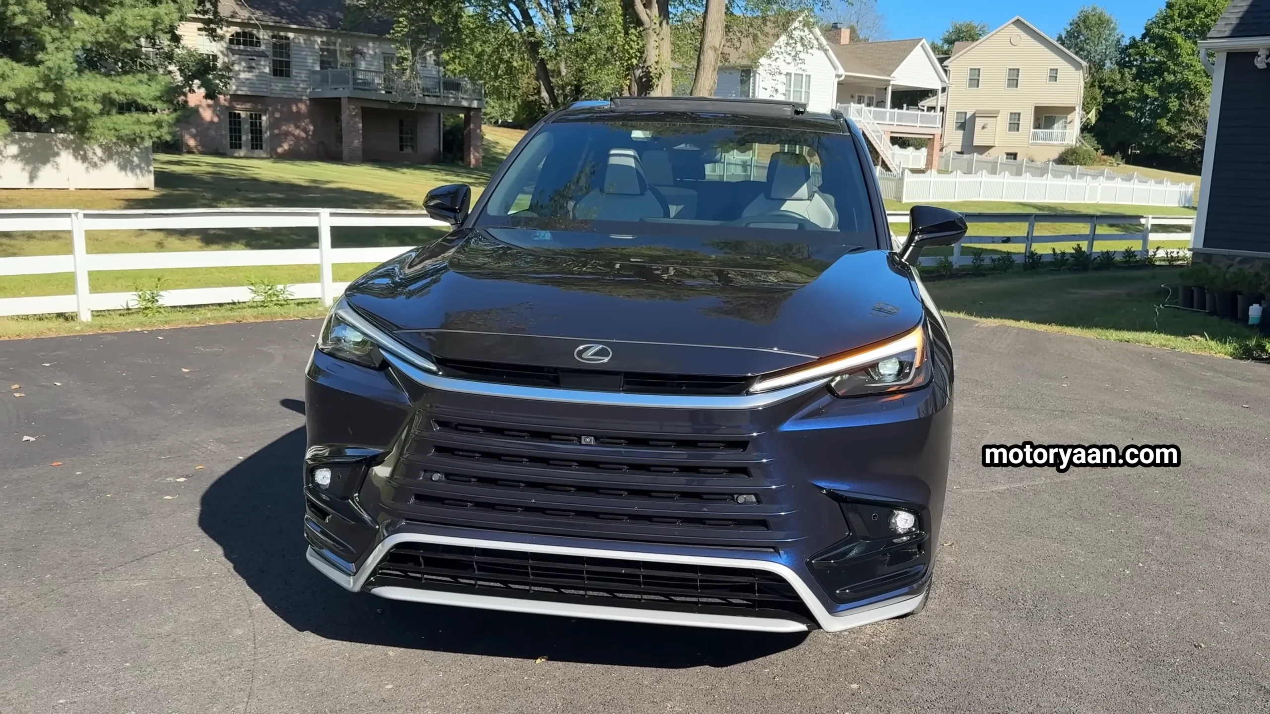 2026 Lexus TX500h F Sport front profile image from a lower angle