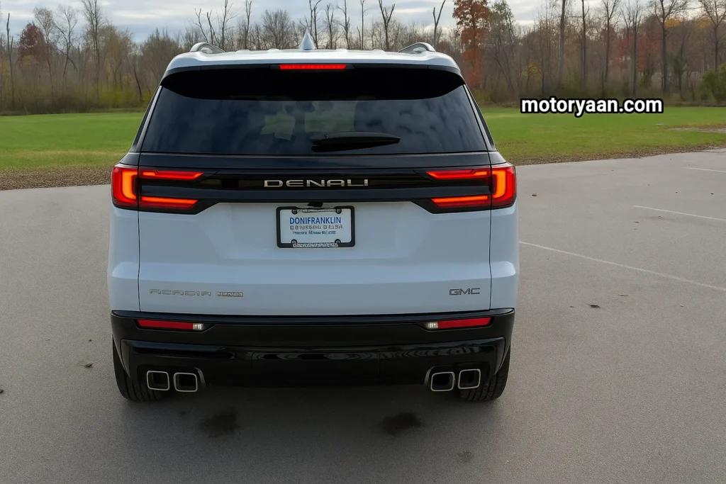 2026 GMC Acadia Denali Ultimate rear profile with LED tail lights and quad exhaust