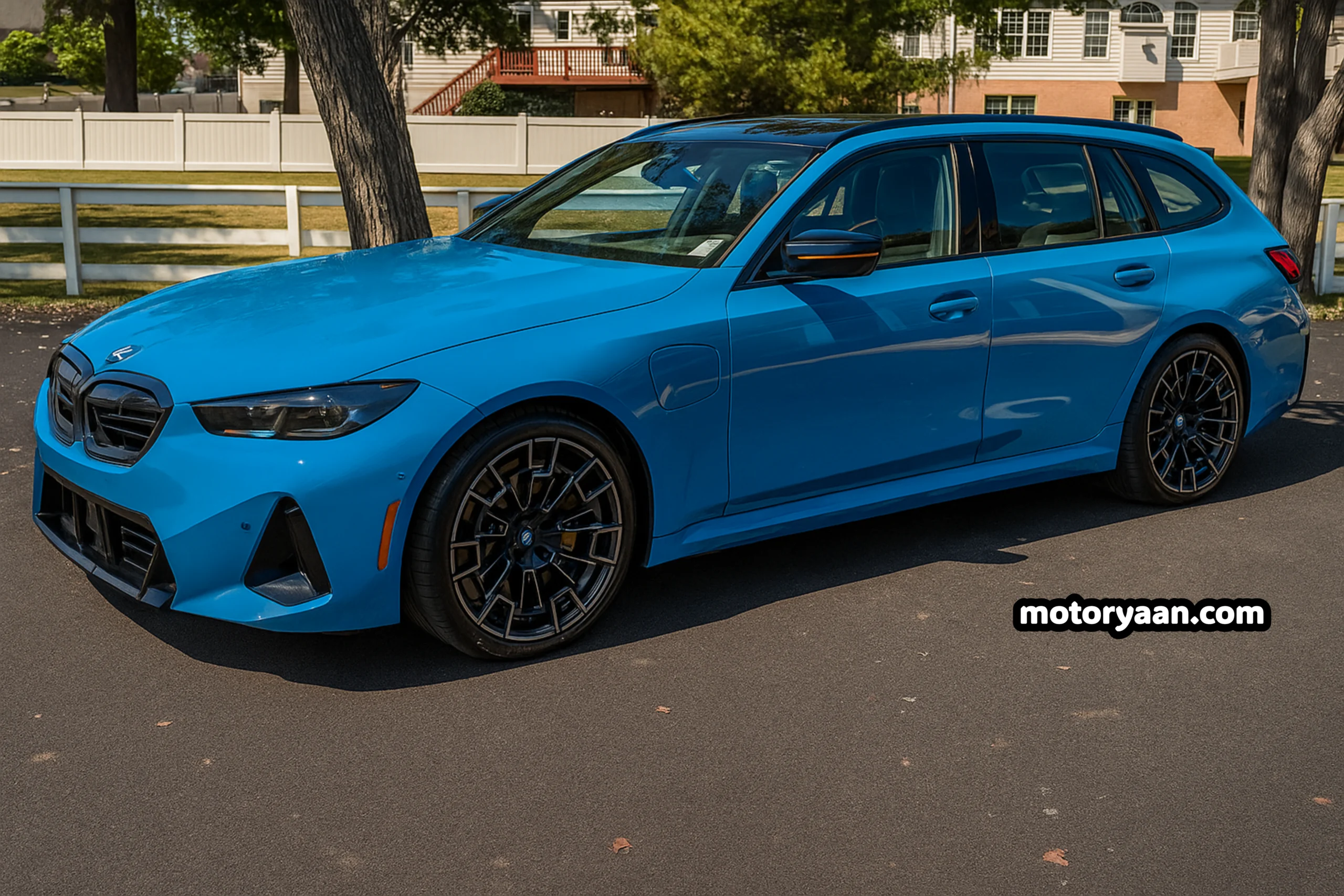 2026 BMW M5 Touring angled front-side view with LED DRLs on
