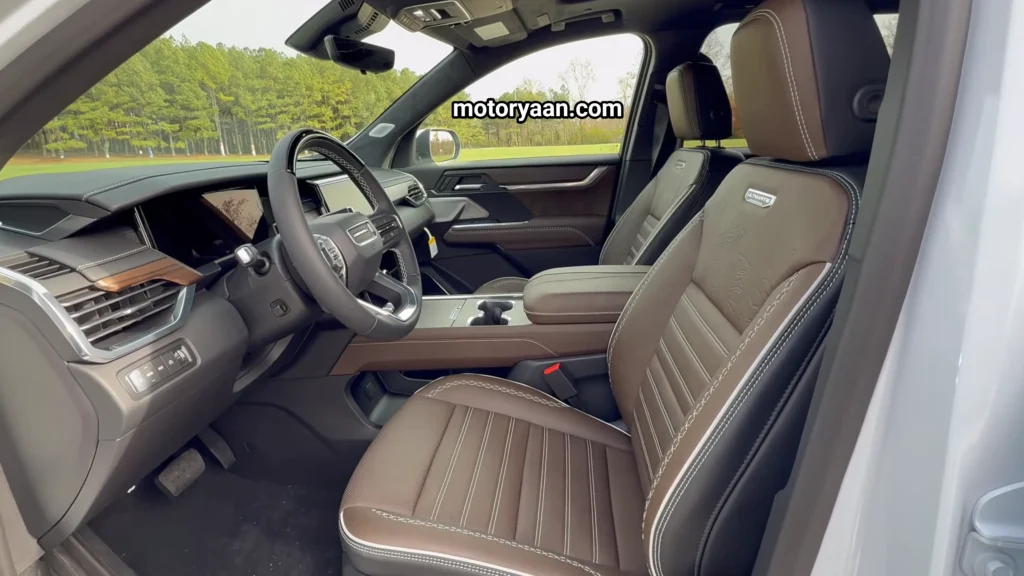 2026 GMC Acadia Denali Ultimate interior with dashboard front seats center console and premium materials