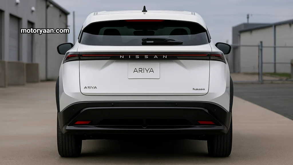 2025 Nissan Ariya Platinum Plus rear profile featuring full-width LED tail-light bar and electric crossover styling.