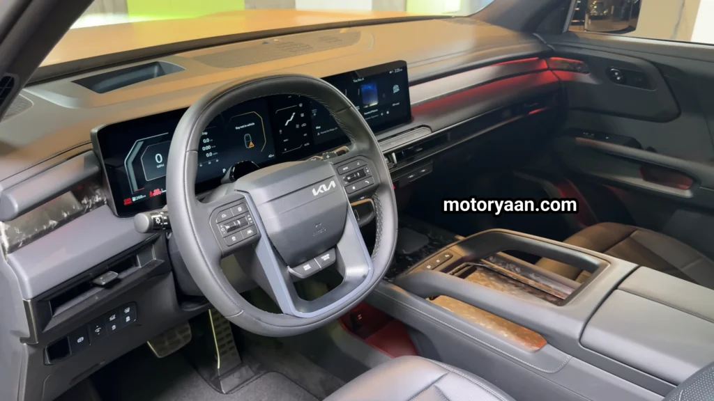 2027 Kia Telluride First Look front interior featuring steering wheel, steering motor controls, infotainment, and cluster.