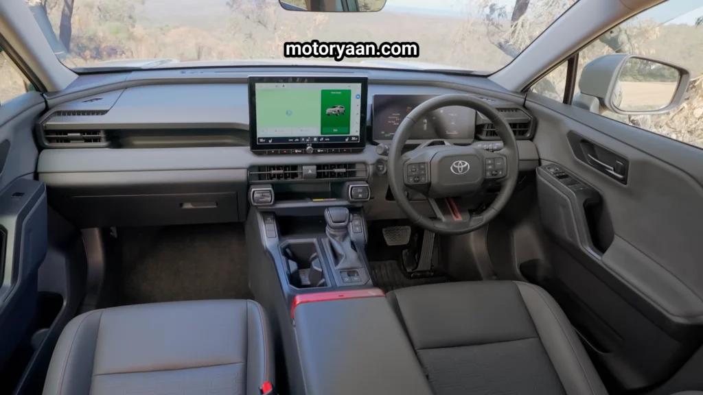 2026 Toyota RAV4 front interior dashboard steering infotainment and seats