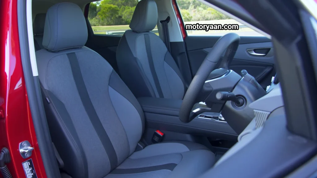 MG S5 EV Detailed Review interior view showing the front seats, center console, and cabin layout.