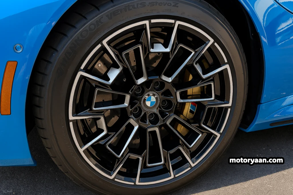 Close-up of BMW M alloy wheel and performance brakes