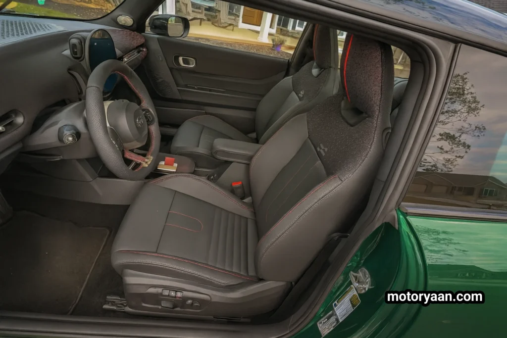 2025 Mini Cooper JCW front interior with dashboard, seats, and infotainment system