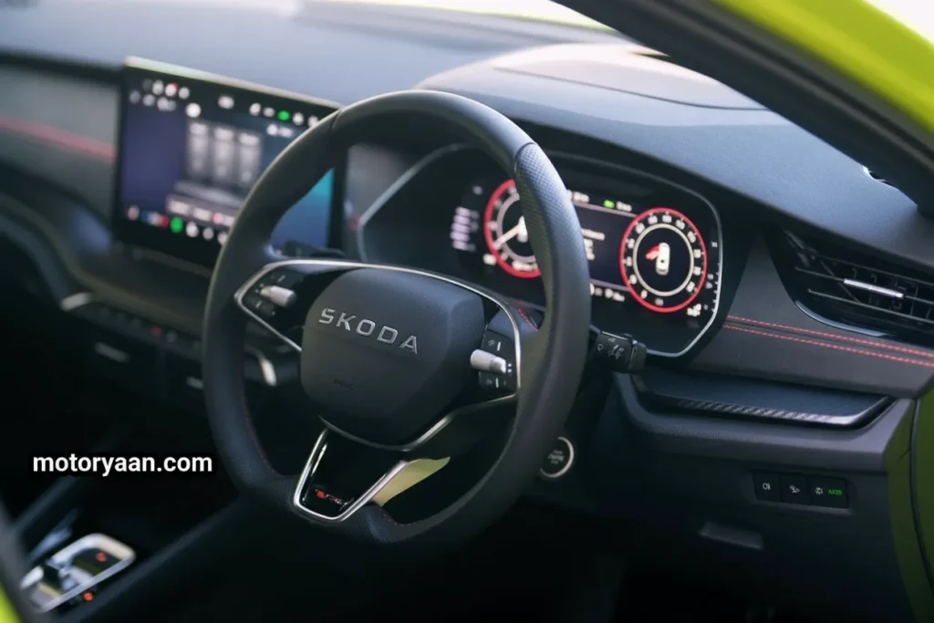 2025 Skoda Octavia RS Facelift front interior with steering wheel, instrument cluster, and infotainment display
