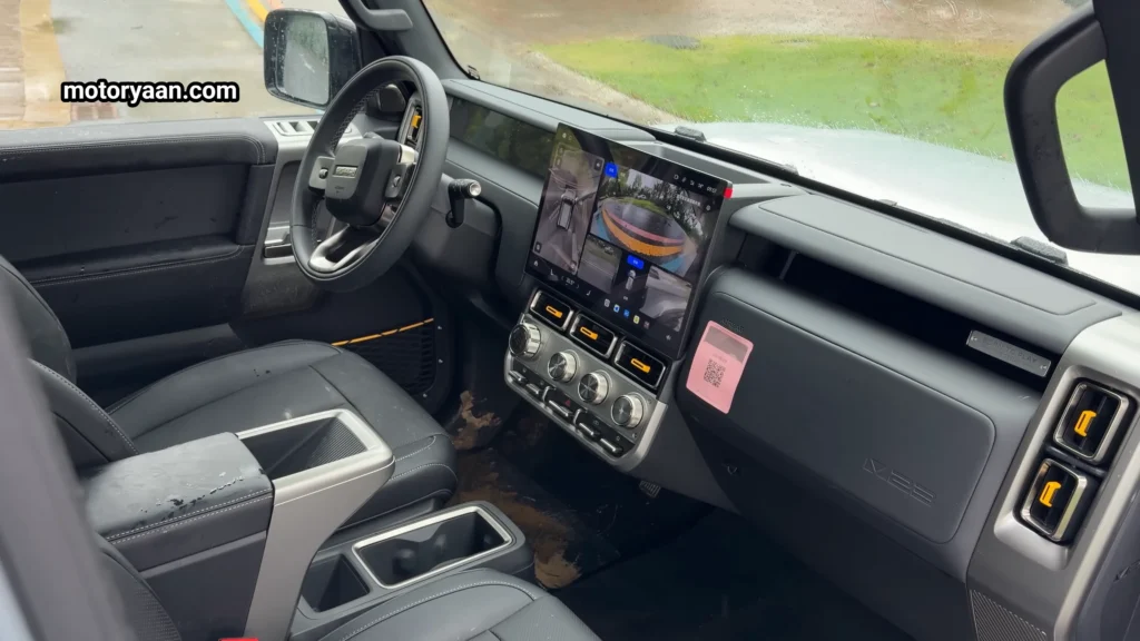 iCar V23 Review interior showing dashboard, center console, front seats, and infotainment system