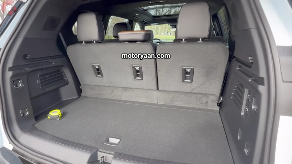 2026 GMC Acadia Denali Ultimate boot space with rear seats and storage area