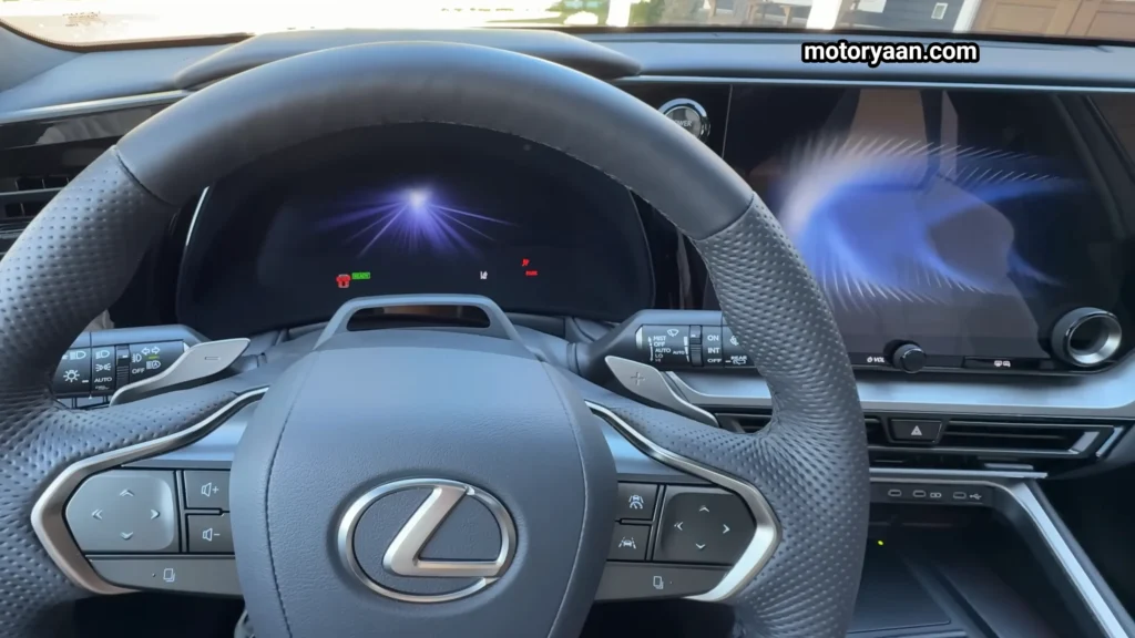 2026 Lexus TX500h F Sport steering wheel, mounted controls, and instrument cluster