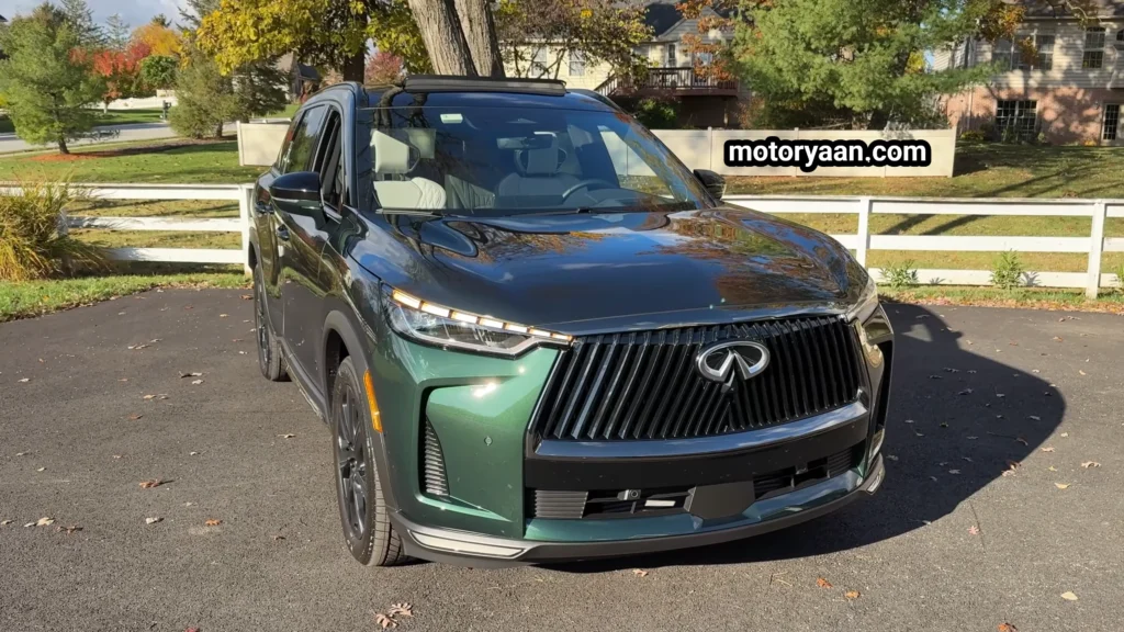 2026 Infiniti QX60 Review showing the front profile with updated grille and LED headlights