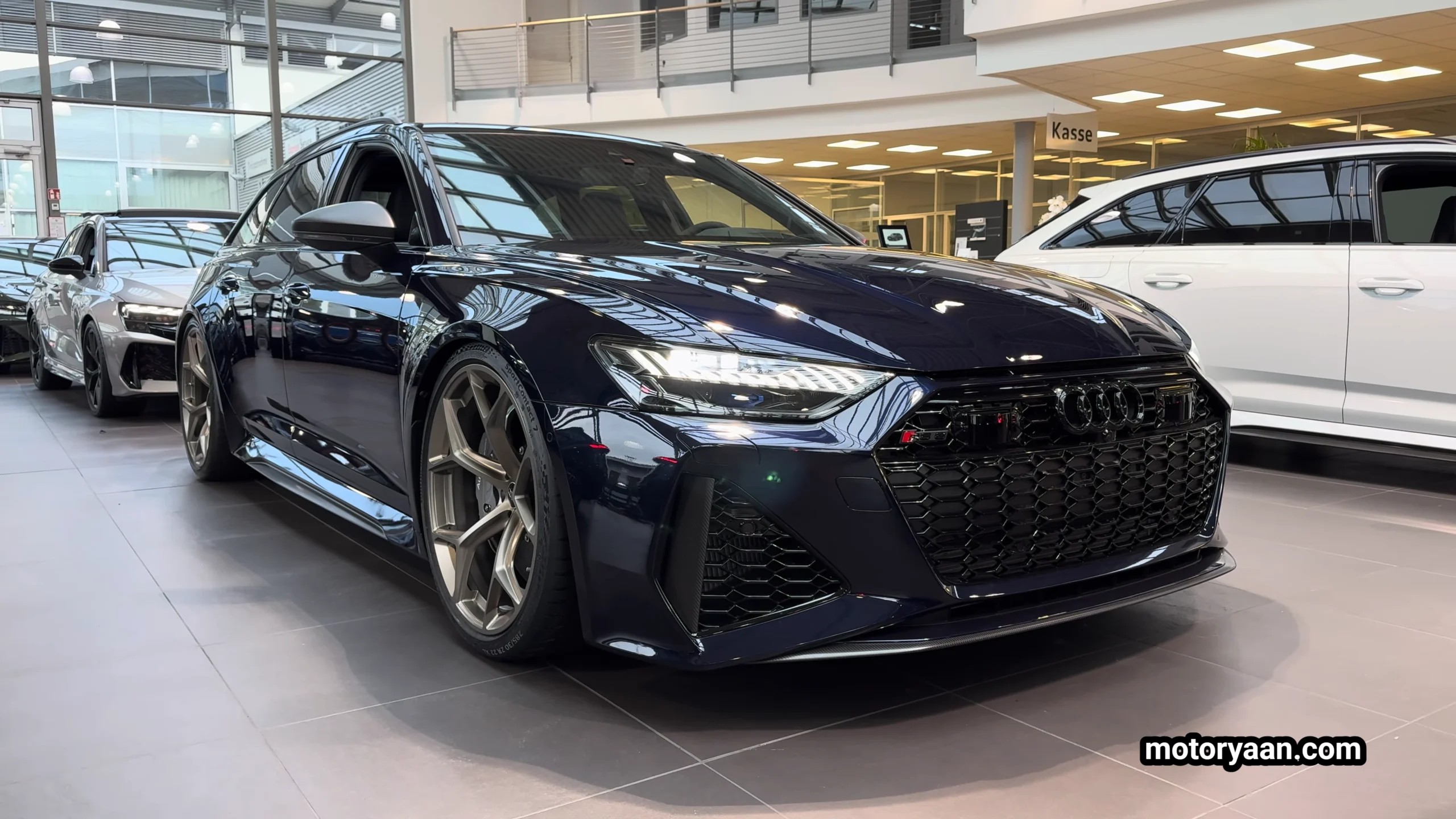 2026 Audi RS6 Avant Performance front and side profile showcasing aggressive wagon stance