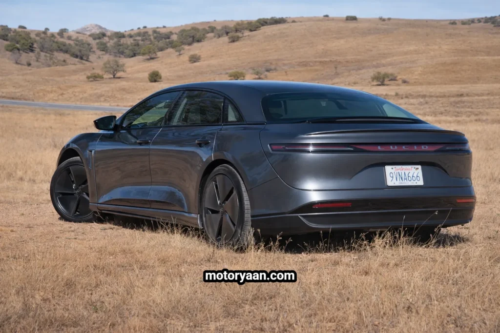 2026 Lucid Air Touring Review displaying the side and rear profile with clamshell trunk design and distinctive rear lighting