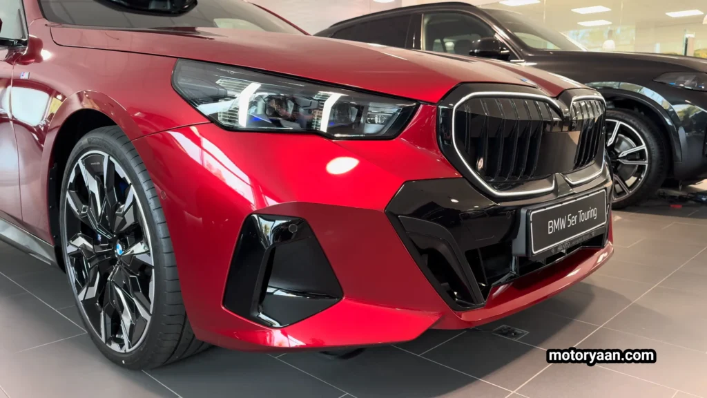 2026 BMW 5 Series 540d xDrive Touring front close-up from side angle