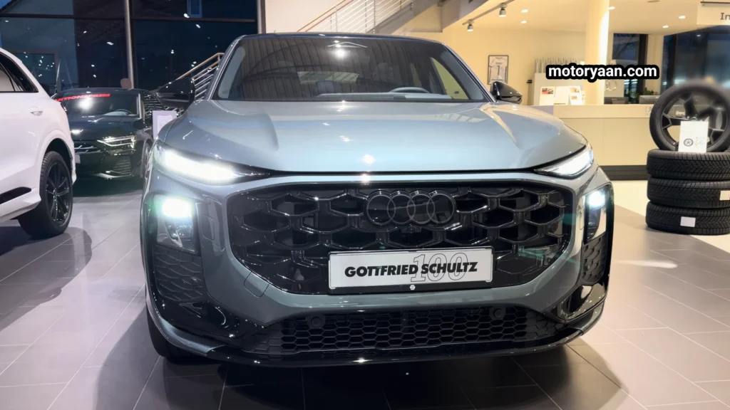 2026 Audi Q3 Sportback front profile with black Audi grille and LED headlamps