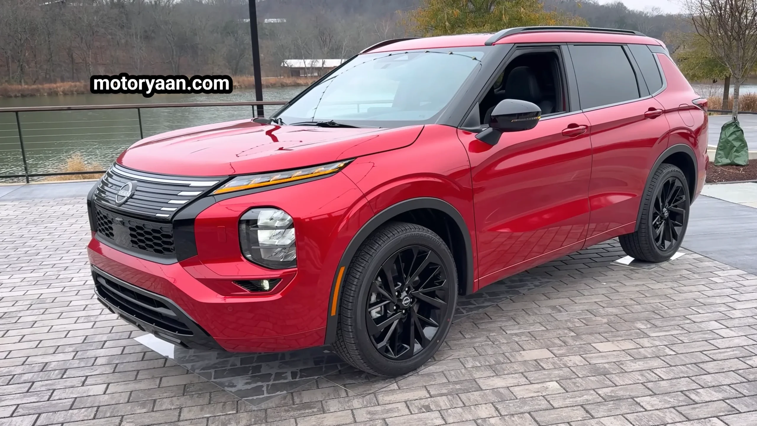 2026 Nissan Rogue Plug-in Hybrid First Drive front and side profile with 20 inch glossy black alloy wheels