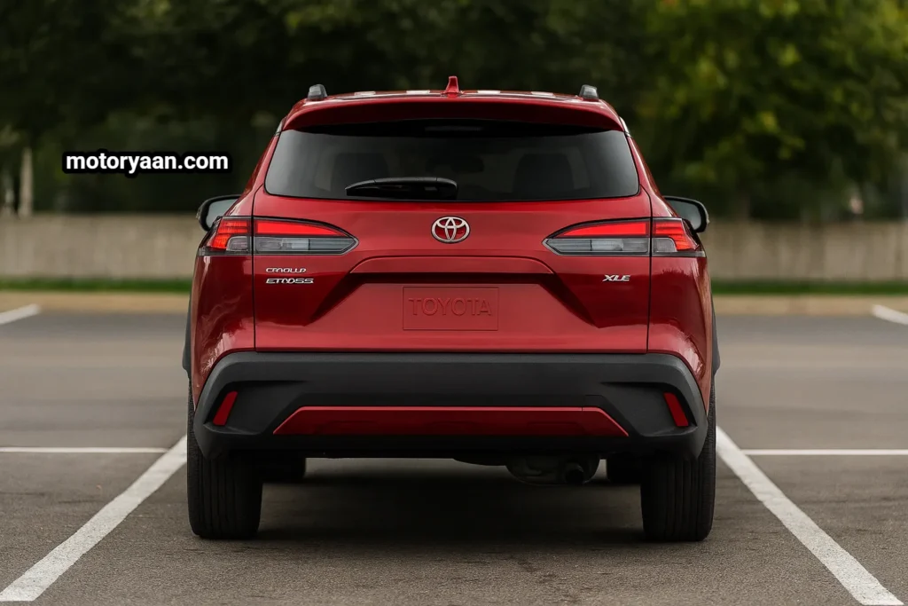2026 Toyota Corolla Cross XLE rear profile showing LED brake lights, updated tail lamp design, rear spoiler, and 1,500-lb towing capability