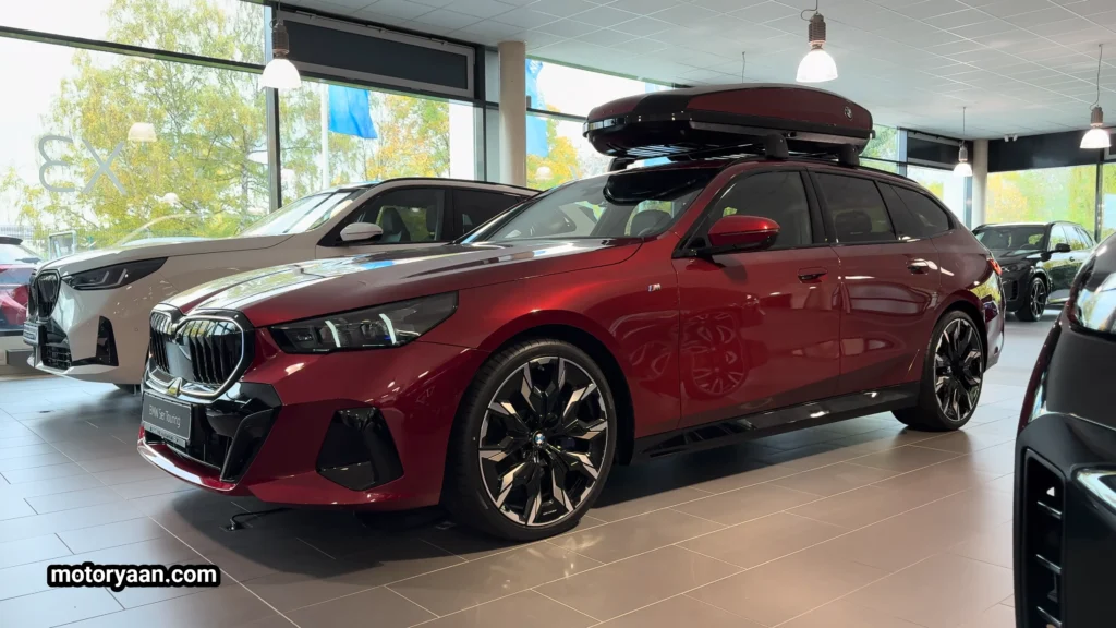 2026 BMW 5 Series 540d xDrive Touring front and side profile alternate angle