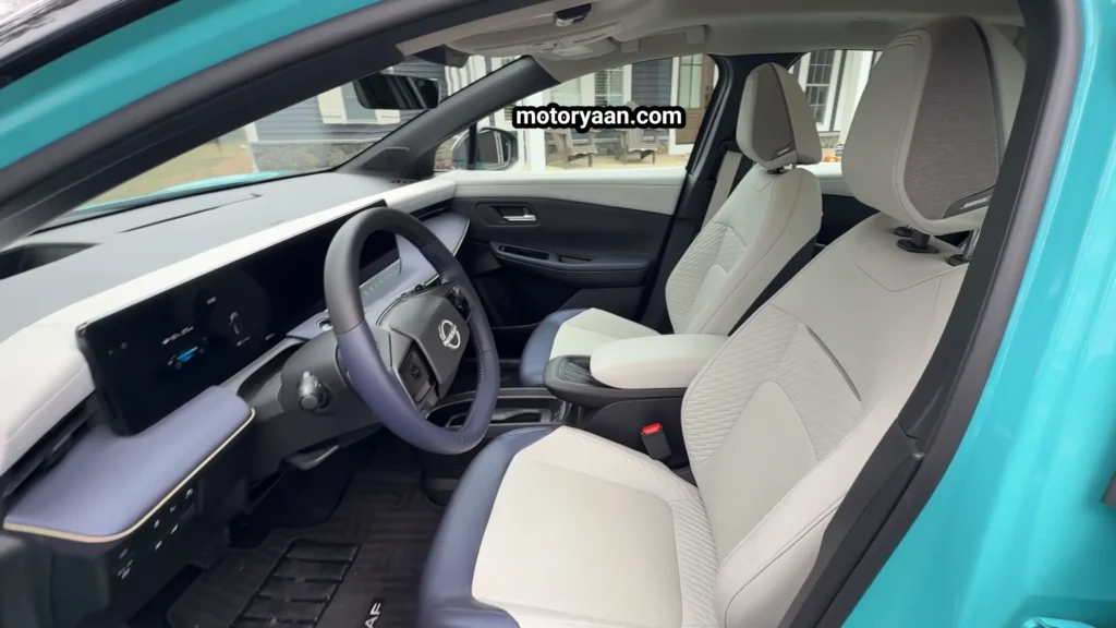 2026 Nissan Leaf Review showing full front interior with dashboard and seats