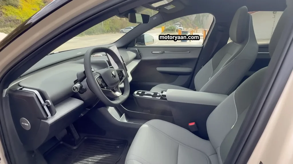 2026 Volvo EX30 Cross Country Review front interior steering wheel dashboard center console and seats