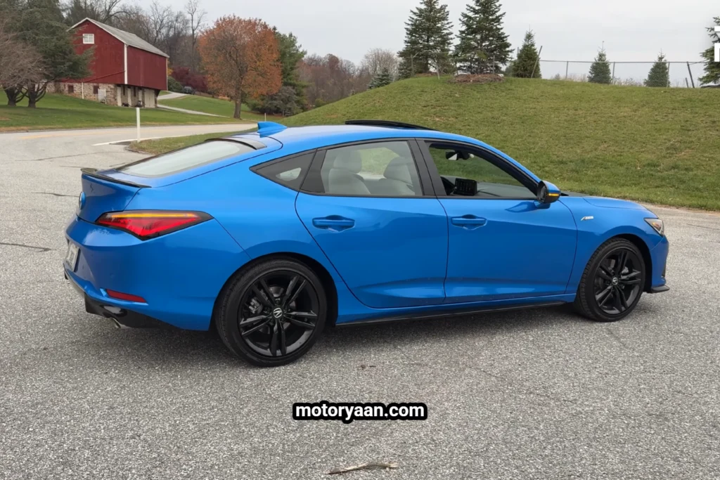 2026 Acura Integra A-Spec Tech side and rear profile with sporty roofline