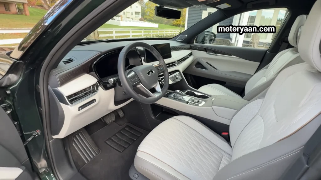 2026 Infiniti QX60 Review dashboard, steering wheel, infotainment, and front seats